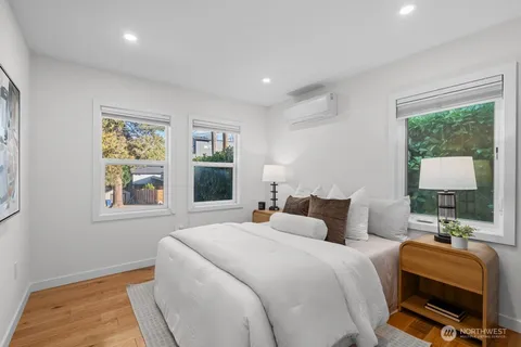 a bedroom with bed room and window