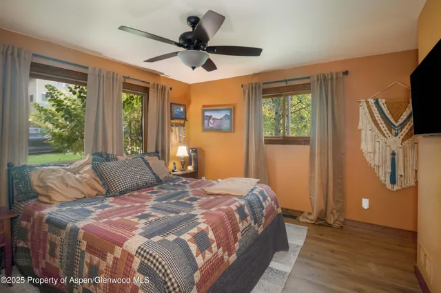 a bathroom with a sink toilet and mirror