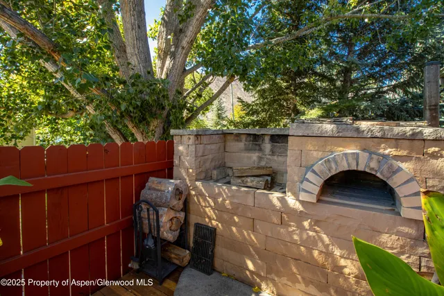 a view of a yard with trees