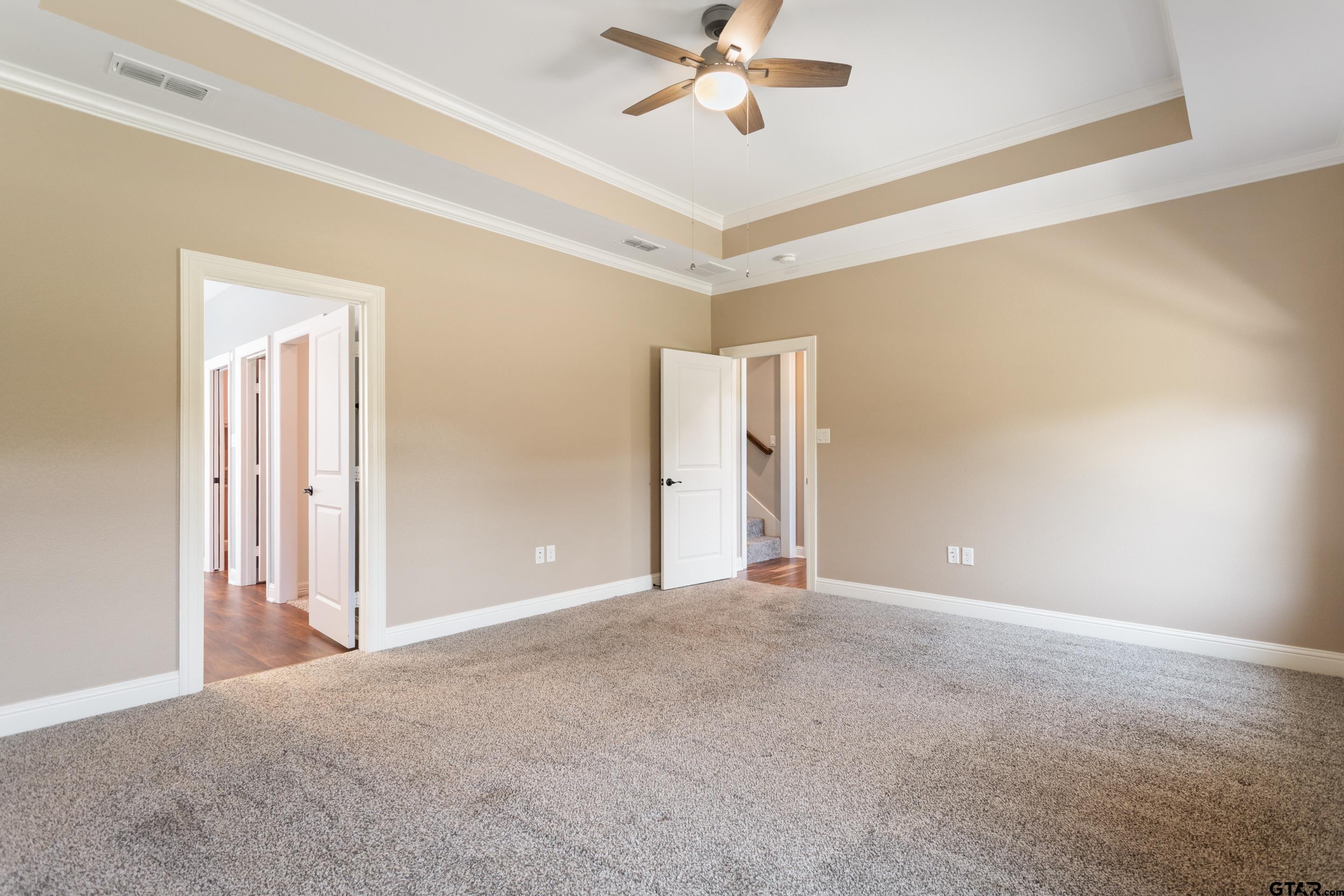 105 Nathan Road Chandler, TX 75758 - Photo 16 of 36 a view of a big room with a chandelier fan