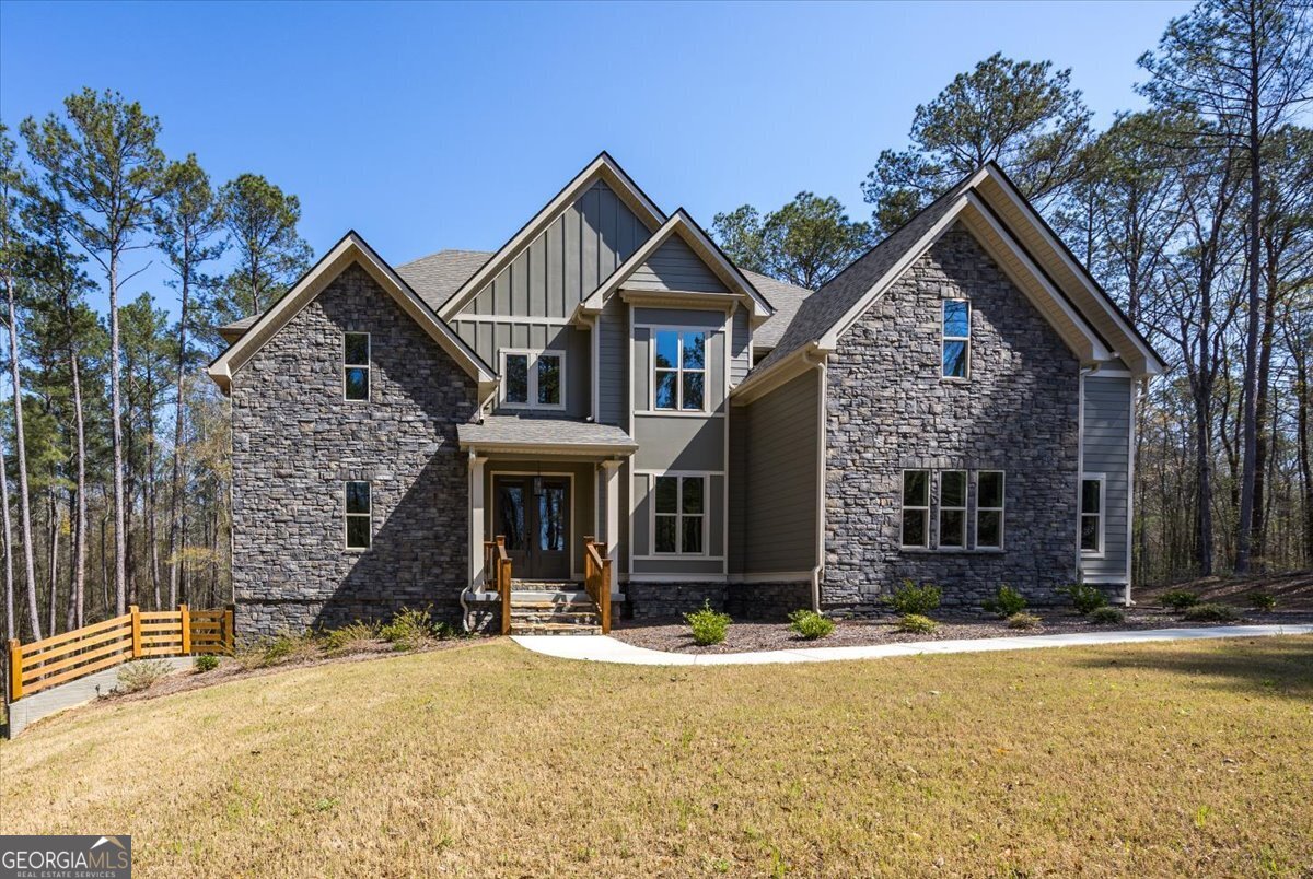 360 Indian Trail Concord, GA 30206 - Photo 1 of 67 a front view of a house with a yard