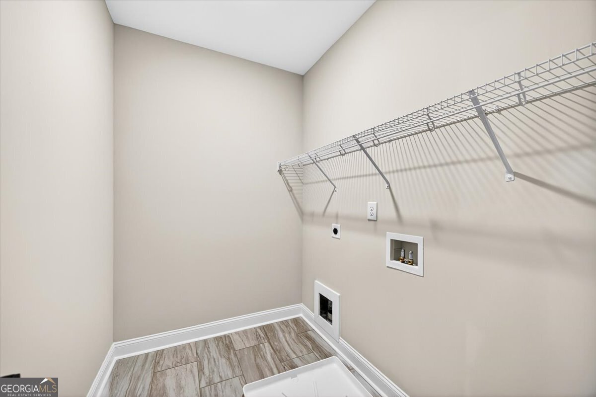 360 Indian Trail Concord, GA 30206 - Photo 20 of 67 a view of a room with rack and tiles