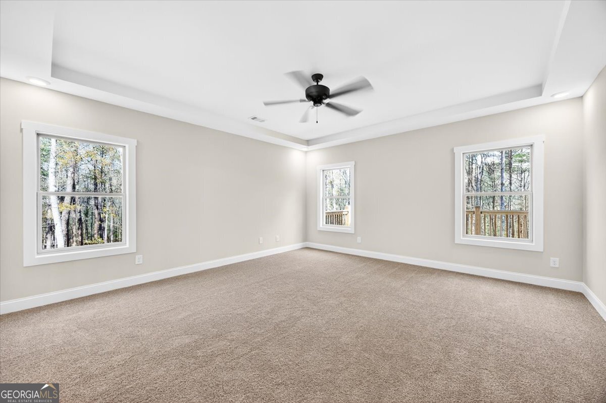 360 Indian Trail Concord, GA 30206 - Photo 21 of 67 a view of an empty room with a window