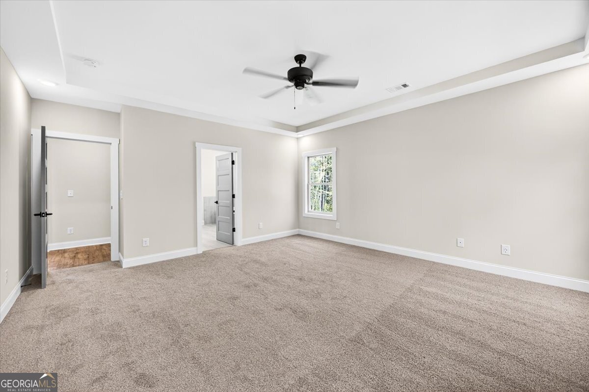 360 Indian Trail Concord, GA 30206 - Photo 22 of 67 a view of an empty room with a window