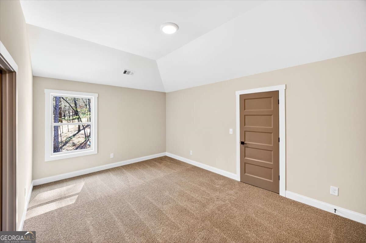 360 Indian Trail Concord, GA 30206 - Photo 34 of 67 an empty room with windows