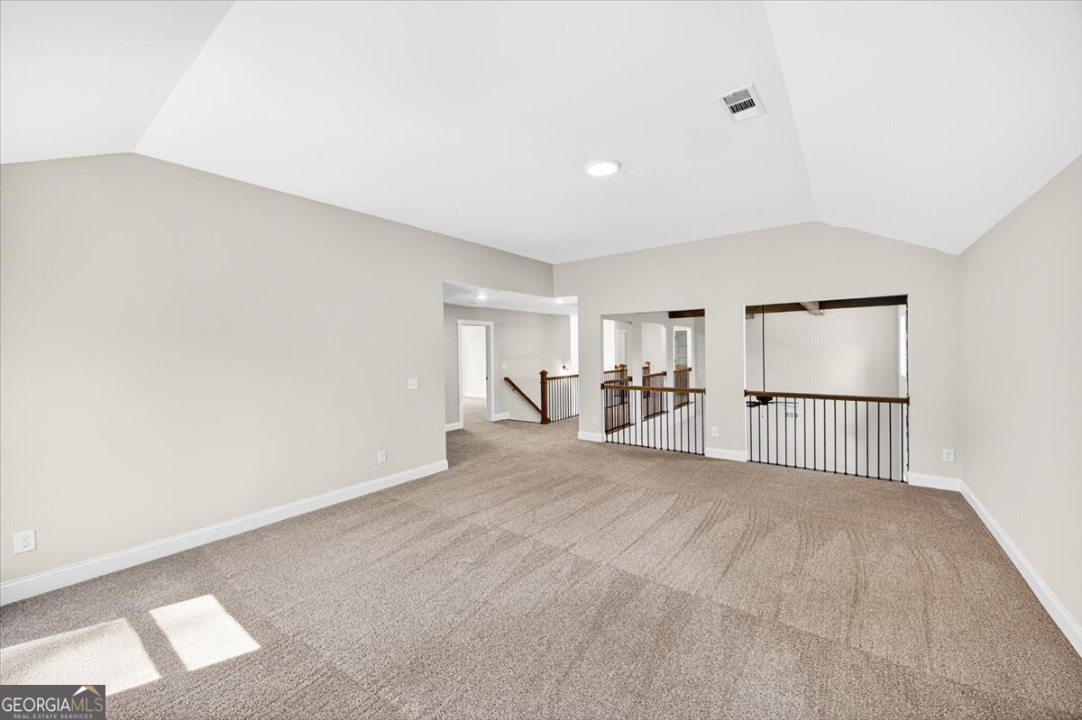 360 Indian Trail Concord, GA 30206 - Photo 37 of 67 a view of a room with wooden floor and windows