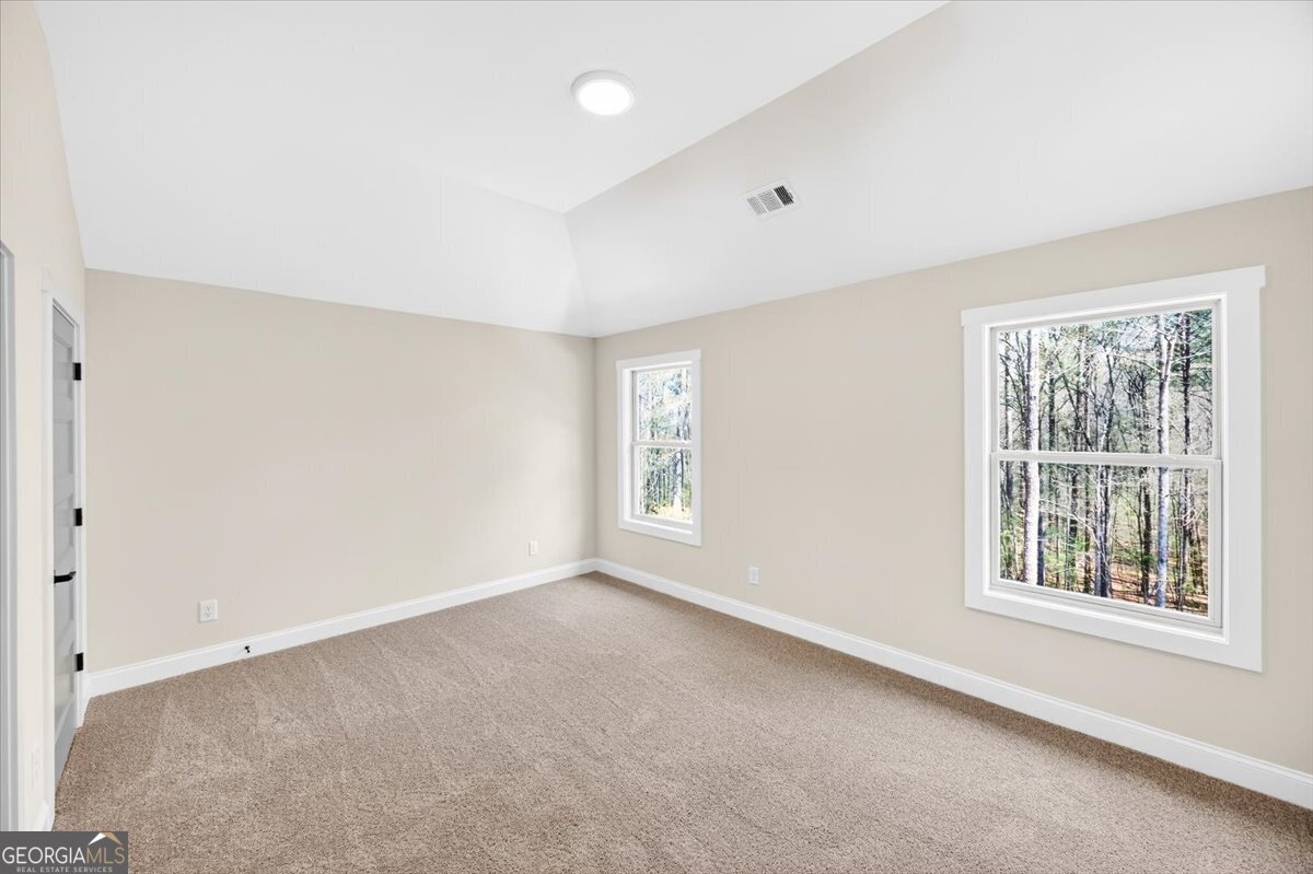 360 Indian Trail Concord, GA 30206 - Photo 39 of 67 an empty room with windows