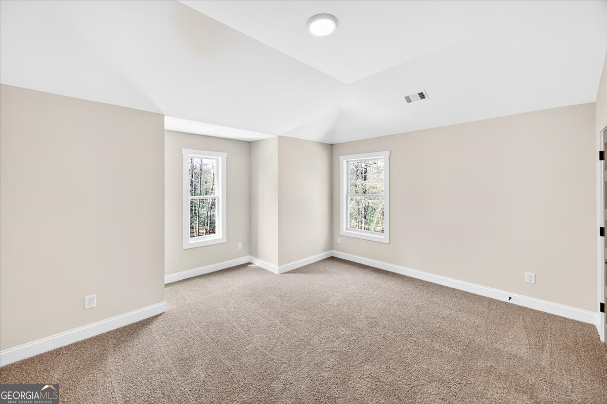 360 Indian Trail Concord, GA 30206 - Photo 43 of 67 an empty room with windows