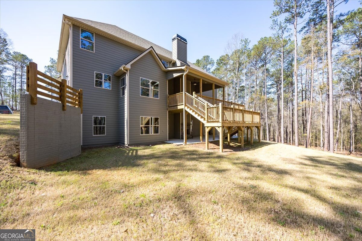 360 Indian Trail Concord, GA 30206 - Photo 51 of 67 a view of a house with snow on the road