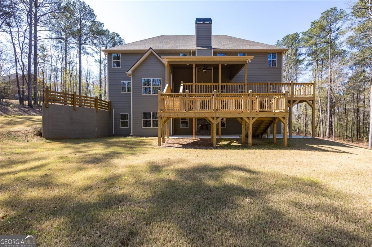 360 Indian Trail Concord, GA 30206 - Photo 52 of 67 a front view of a house with a yard and garage