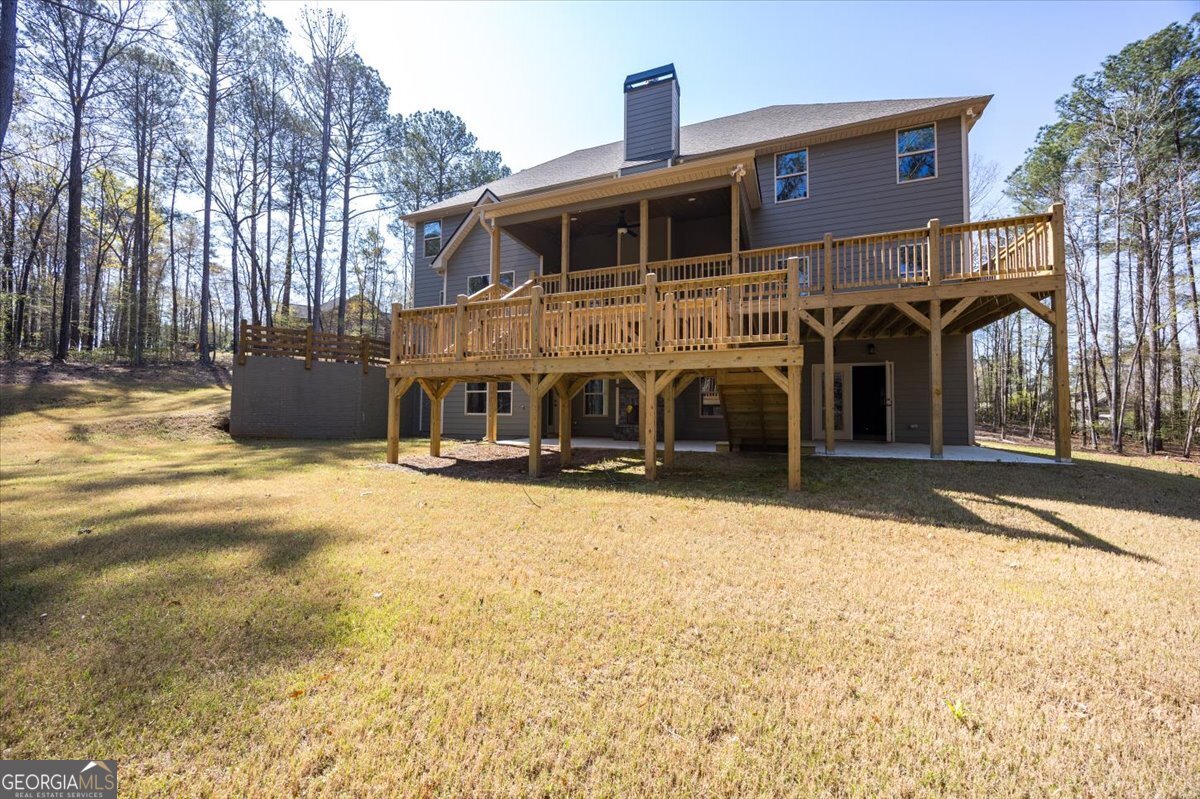 360 Indian Trail Concord, GA 30206 - Photo 53 of 67 a front view of a house with a yard
