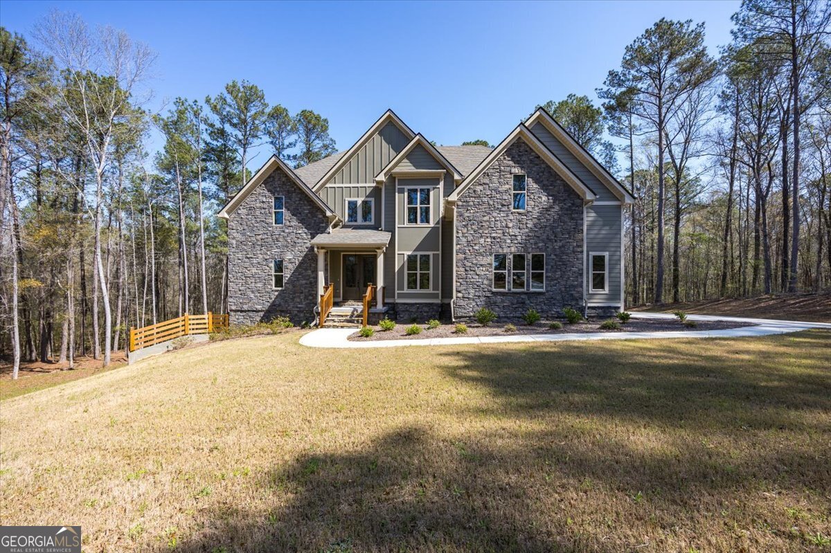 360 Indian Trail Concord, GA 30206 - Photo 54 of 67 a view of a house with swimming pool and sitting area