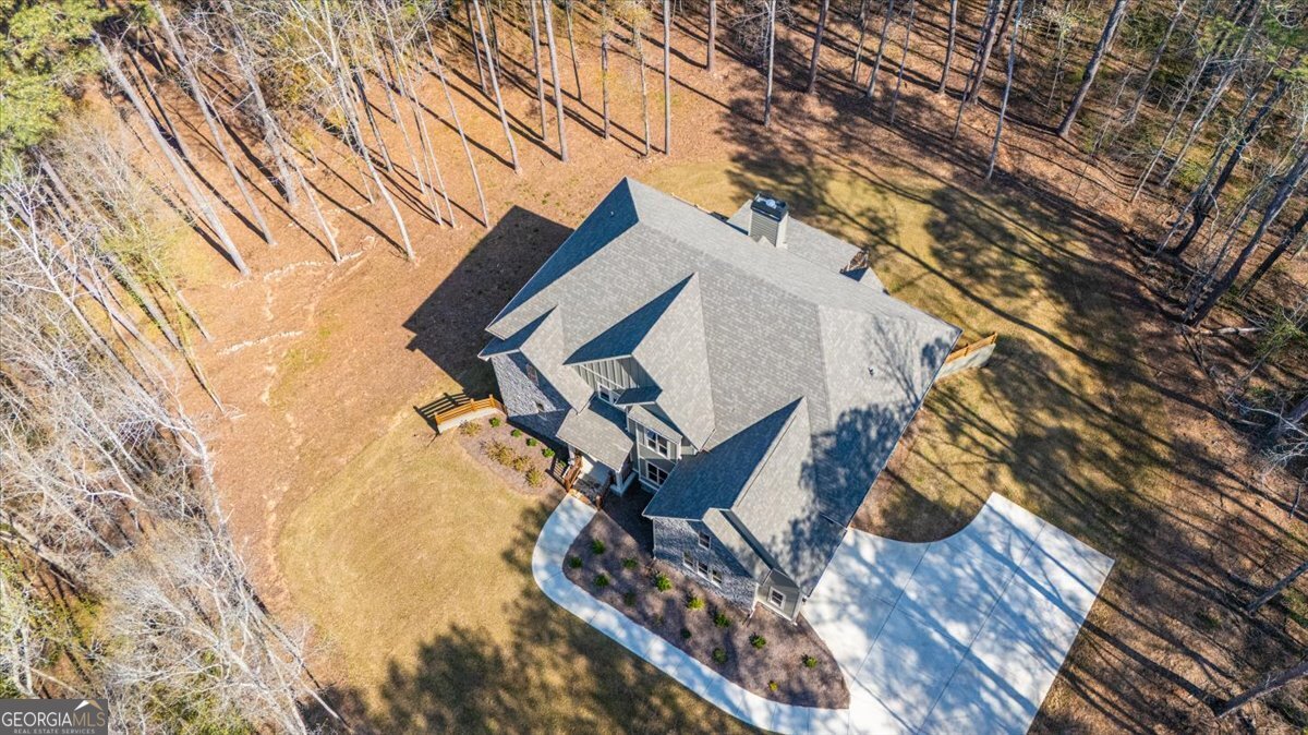 360 Indian Trail Concord, GA 30206 - Photo 56 of 67 a view of a house with a yard