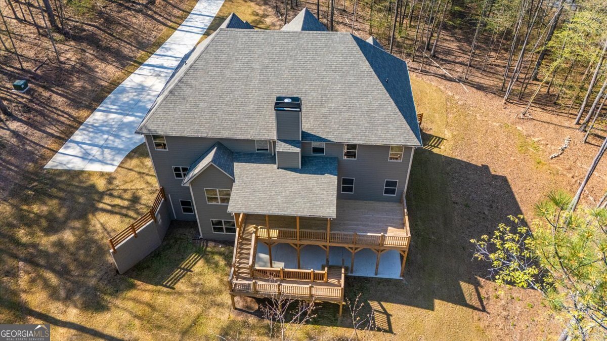 360 Indian Trail Concord, GA 30206 - Photo 60 of 67 a aerial view of a house with a yard and balcony