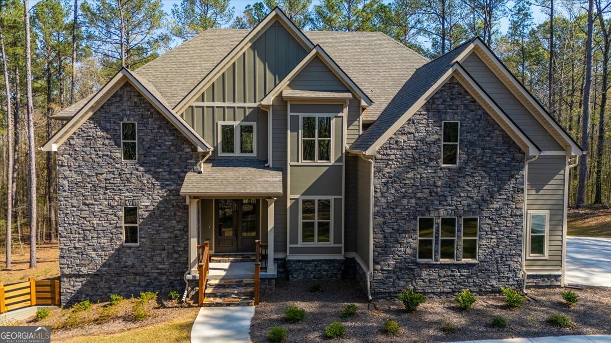 360 Indian Trail Concord, GA 30206 - Photo 64 of 67 a front view of a house with yard