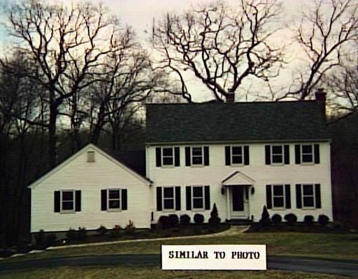 2 Great Pond Road Ridgefield, CT 06877 - Photo 1 of 1 a front view of a house with a yard