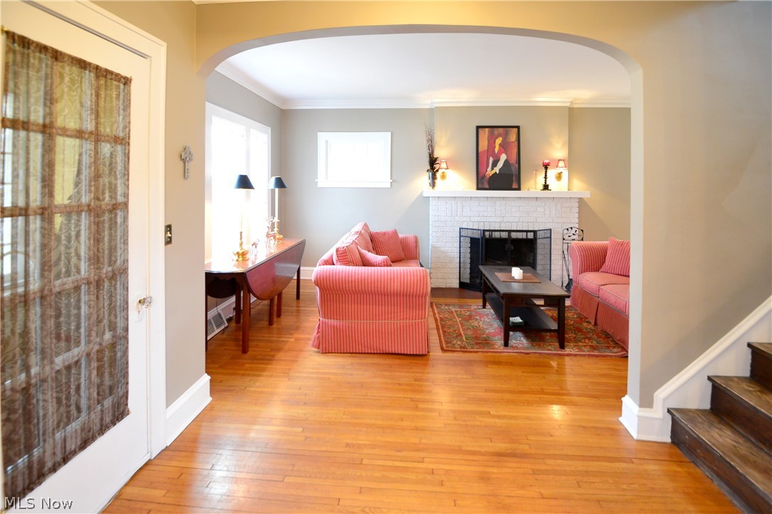 15629 Munn Road Cleveland, OH 44111 - Photo 11 of 24 A view from the Dinning rm shows of the pretty HRD Wd Flrs & space the Foyer has to offer...A beautiful feature about this home are all the flat ceilings thru out.