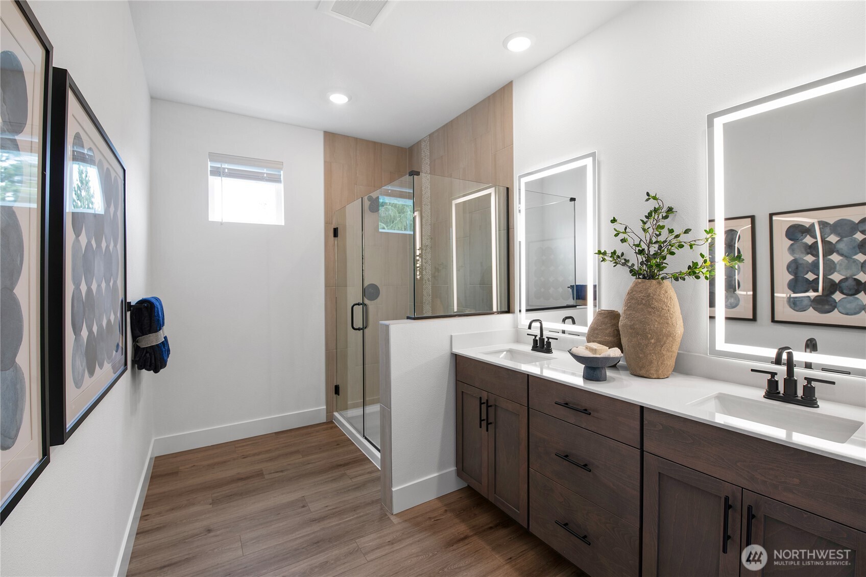 610 Gooseberry Place Sequim, WA 98382 - Photo 16 of 31 a bathroom with a double vanity sink mirror and shower
