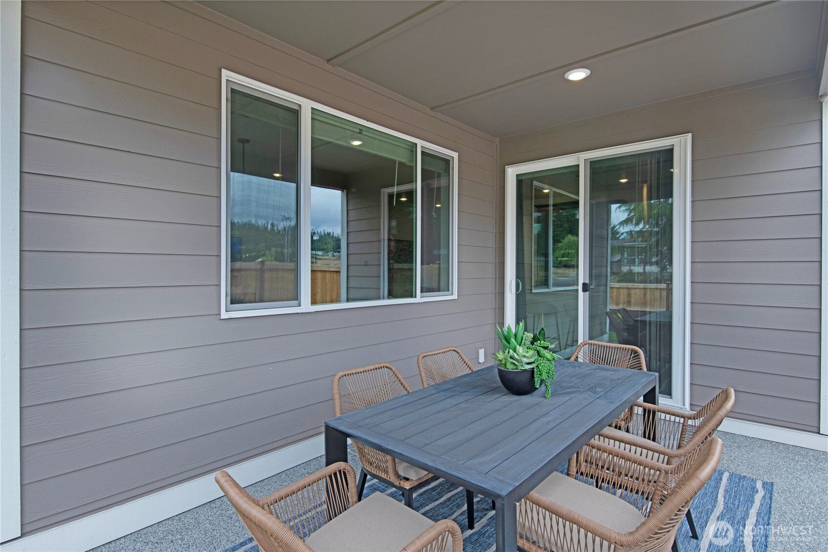 610 Gooseberry Place Sequim, WA 98382 - Photo 5 of 31 a view of a house with sitting area and furniture