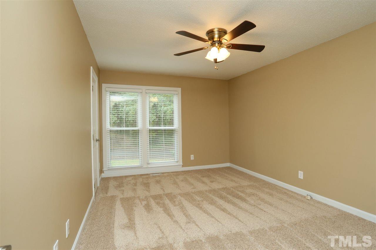 814 Temple Street Raleigh, NC 27609 - Photo 13 of 19 Large 2nd bedroom with upgraded carpet in excellent condition.