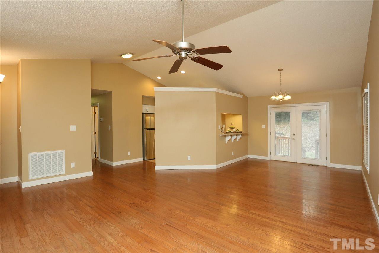 814 Temple Street Raleigh, NC 27609 - Photo 3 of 19 Open living/ dining/ kitchen, perfect for entertaining. Hardwood floors in living, dining and hall