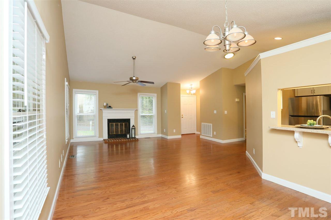 814 Temple Street Raleigh, NC 27609 - Photo 4 of 19 Open living/ dining/ kitchen, perfect for entertaining. Hardwood floors in living, dining and hall