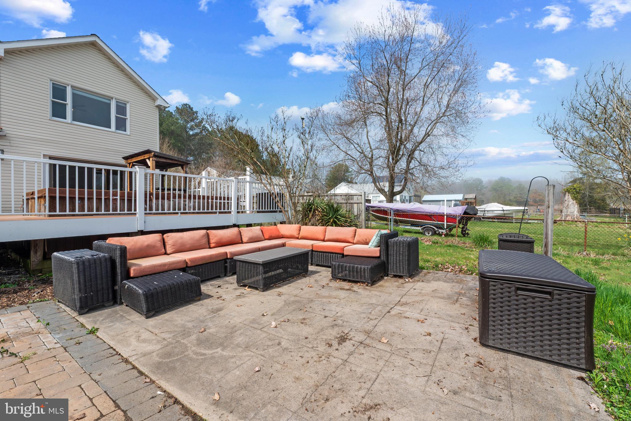 5929 Deale Beach Road Deale, MD 20751 - Photo 51 of 58 Fenced backyard with a patio area and an outdoor l