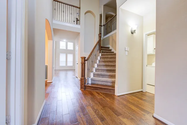 a view of entryway with wooden floor