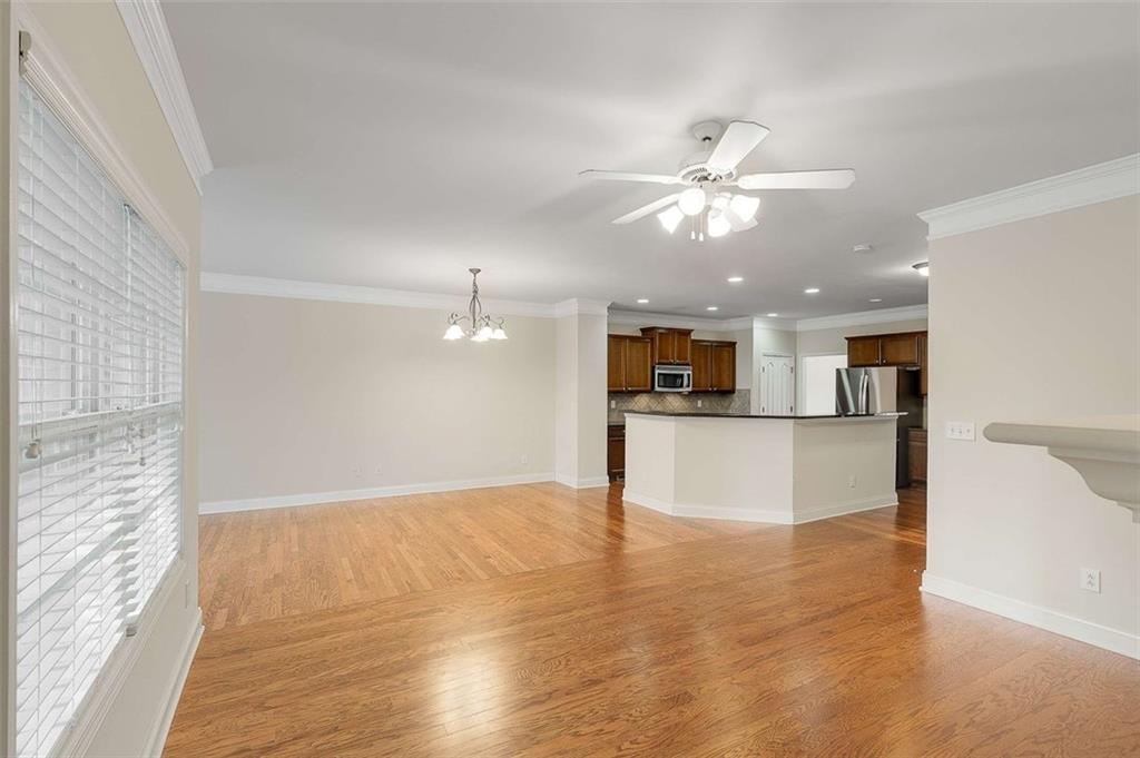 3199 Buck Way Alpharetta, GA 30004 - Photo 12 of 43 a view of an empty room with kitchen and kitchen view