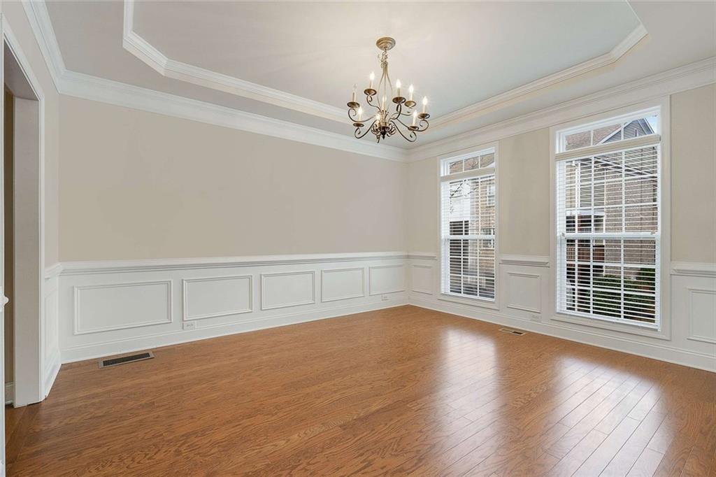 3199 Buck Way Alpharetta, GA 30004 - Photo 15 of 45 wooden floor in an empty room with a window