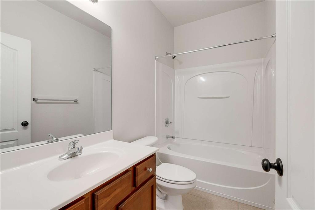 3199 Buck Way Alpharetta, GA 30004 - Photo 26 of 45 a bathroom with a sink toilet and shower