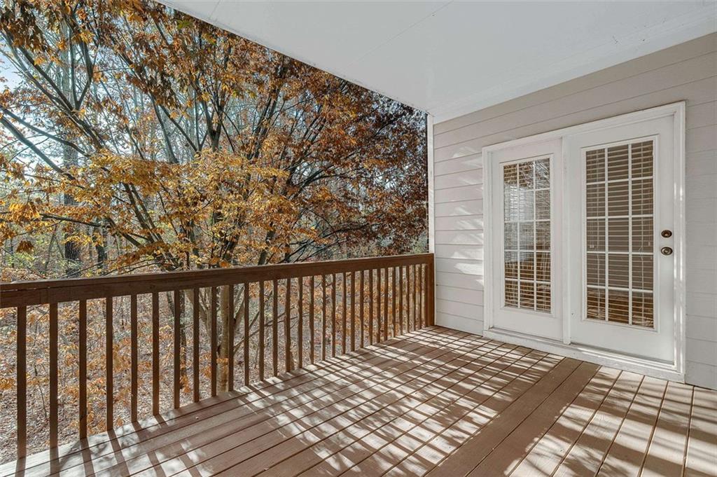 3199 Buck Way Alpharetta, GA 30004 - Photo 34 of 43 a view of a balcony with wooden floor