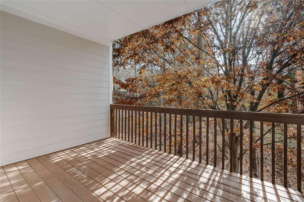 3199 Buck Way Alpharetta, GA 30004 - Photo 35 of 43 a view of a balcony with wooden floor