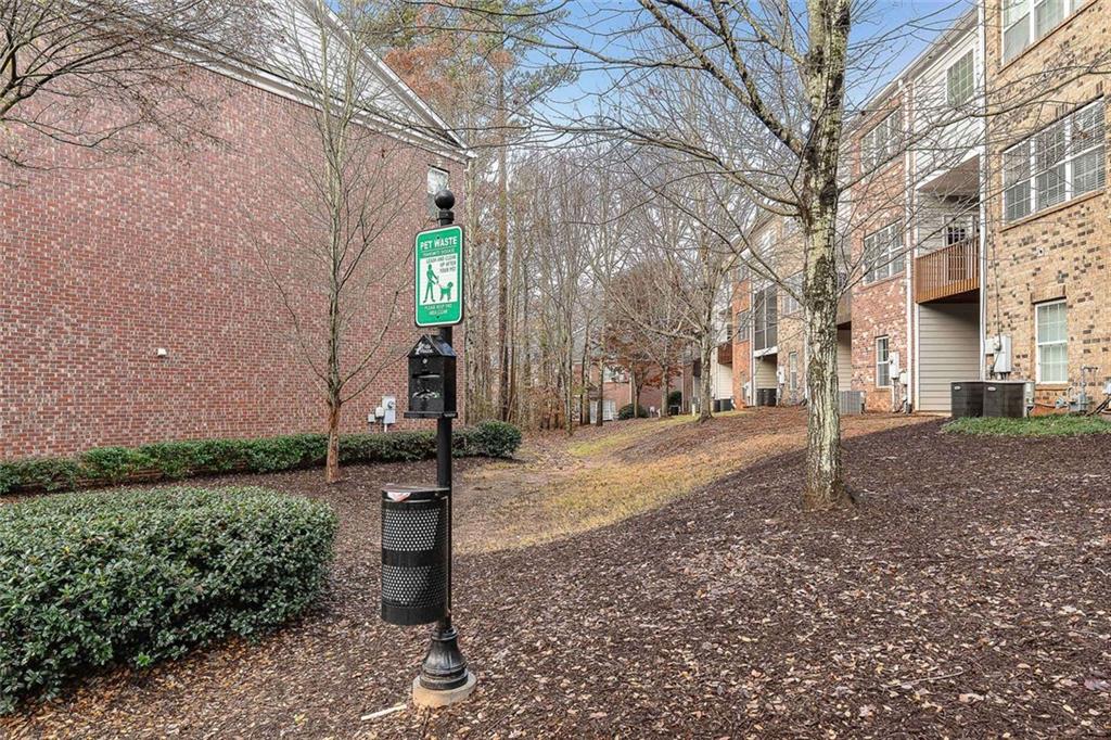 3199 Buck Way Alpharetta, GA 30004 - Photo 38 of 45 a backyard of a house with lots of green space