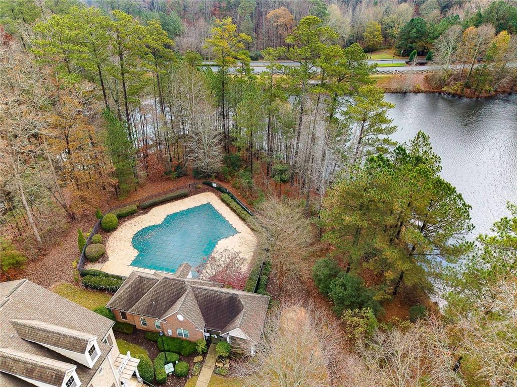 3199 Buck Way Alpharetta, GA 30004 - Photo 42 of 45 an aerial view of a house with a yard and lake view