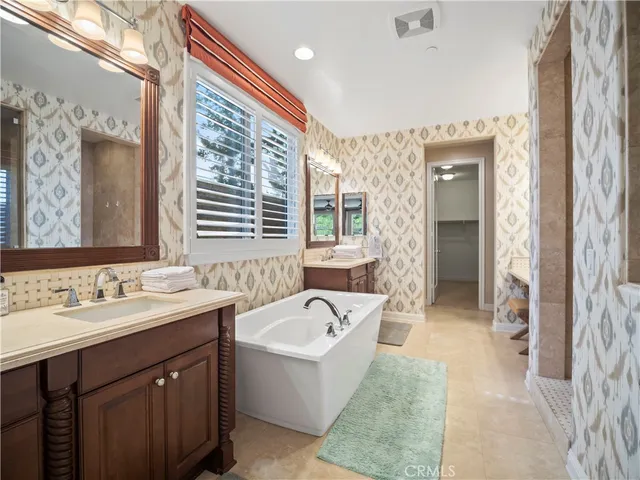 a bathroom with a sink and a bathtub