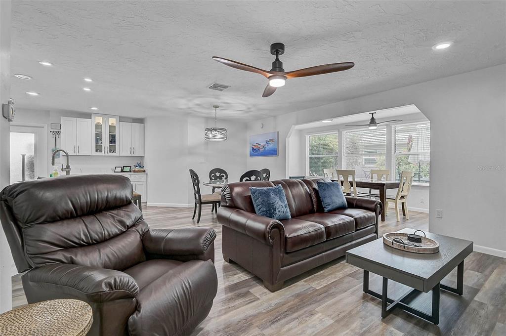 6308 Midnight Pass Road, Unit 6 Sarasota, FL 34242 - Photo 14 of 44 a living room with furniture