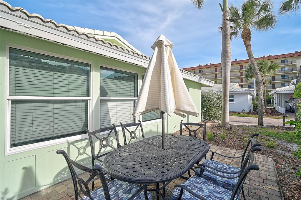 6308 Midnight Pass Road, Unit 6 Sarasota, FL 34242 - Photo 27 of 44 a view of outdoor space yard and patio