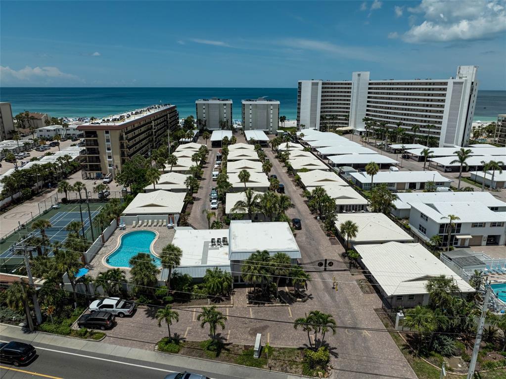 6308 Midnight Pass Road, Unit 6 Sarasota, FL 34242 - Photo 36 of 44 an aerial view of multiple houses