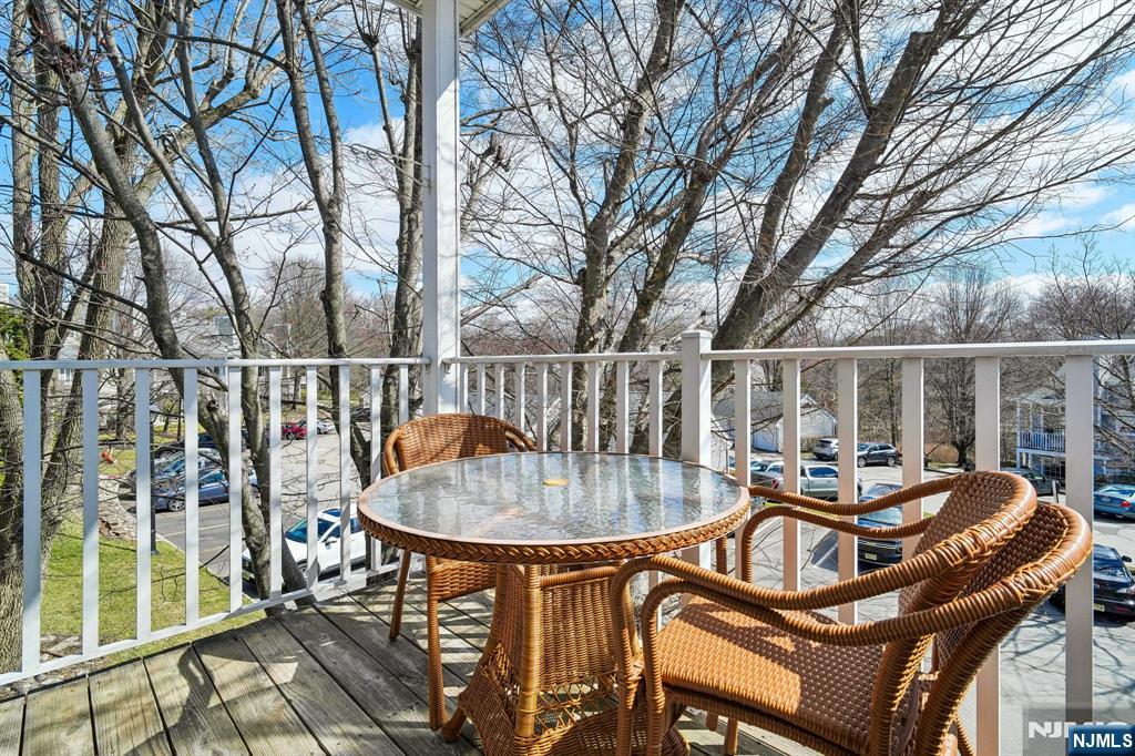 1317 Paddington Road Mahwah, NJ 07430 - Photo 20 of 28 a backyard of a house with barbeque oven table and chairs