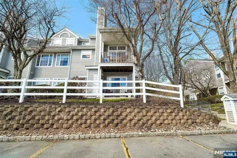 front view of a house with a street
