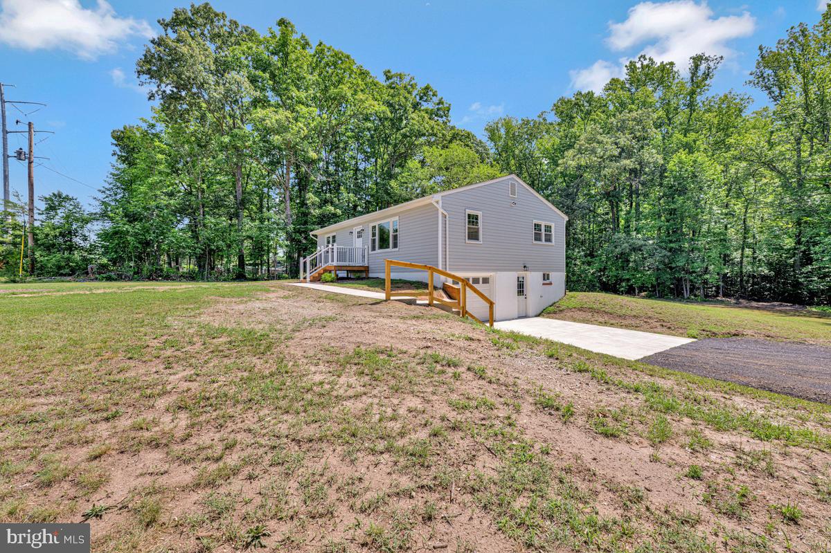 13304 Cherry Tree Crossing Road Brandywine, MD 20613 - Photo 7 of 32 Charming home nestled in nature's embrace.