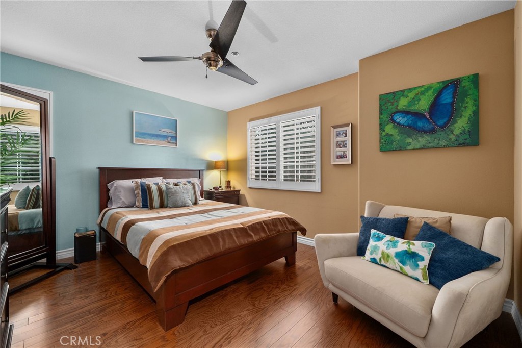 4140 Garvey Way Riverside, CA 92501 - Photo 15 of 25 a bedroom with a bed couch and a window