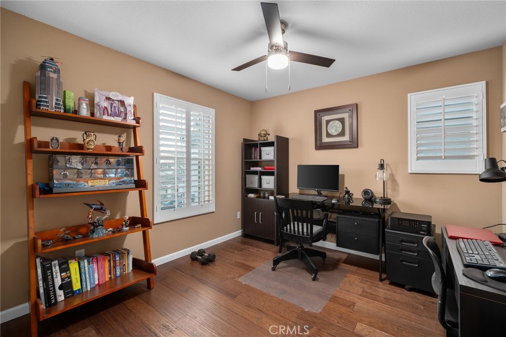 4140 Garvey Way Riverside, CA 92501 - Photo 17 of 25 a view of a workspace with furniture and a window