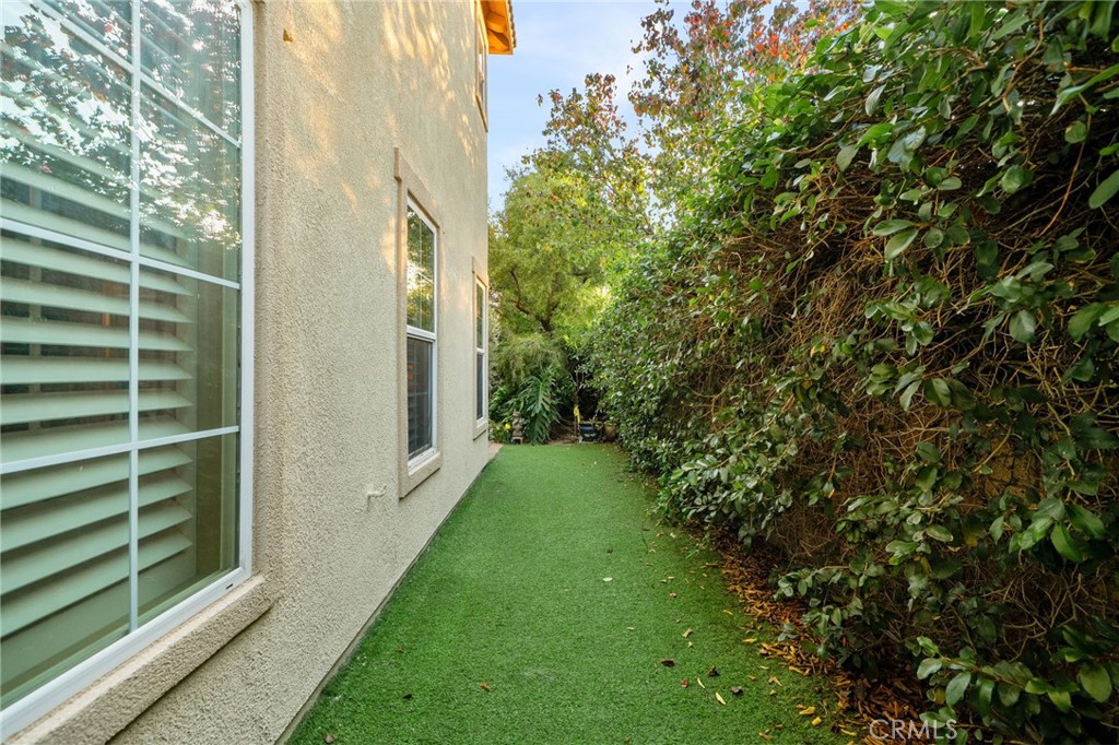 4140 Garvey Way Riverside, CA 92501 - Photo 22 of 25 a view of a back yard from a balcony