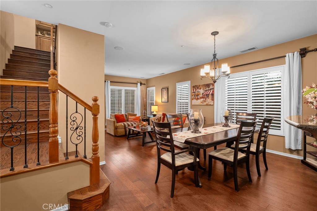 4140 Garvey Way Riverside, CA 92501 - Photo 5 of 25 a view of a livingroom with furniture window and wooden floor