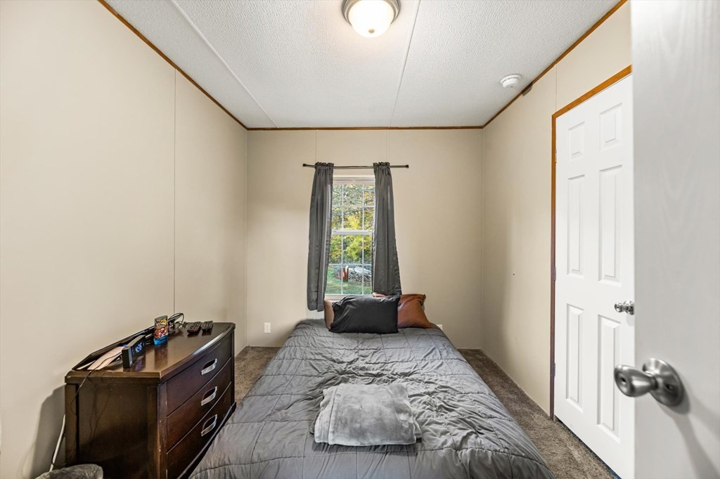 160 Beverly Drive Decatur, TN 37322 - Photo 15 of 31 a bedroom with a bed and a window