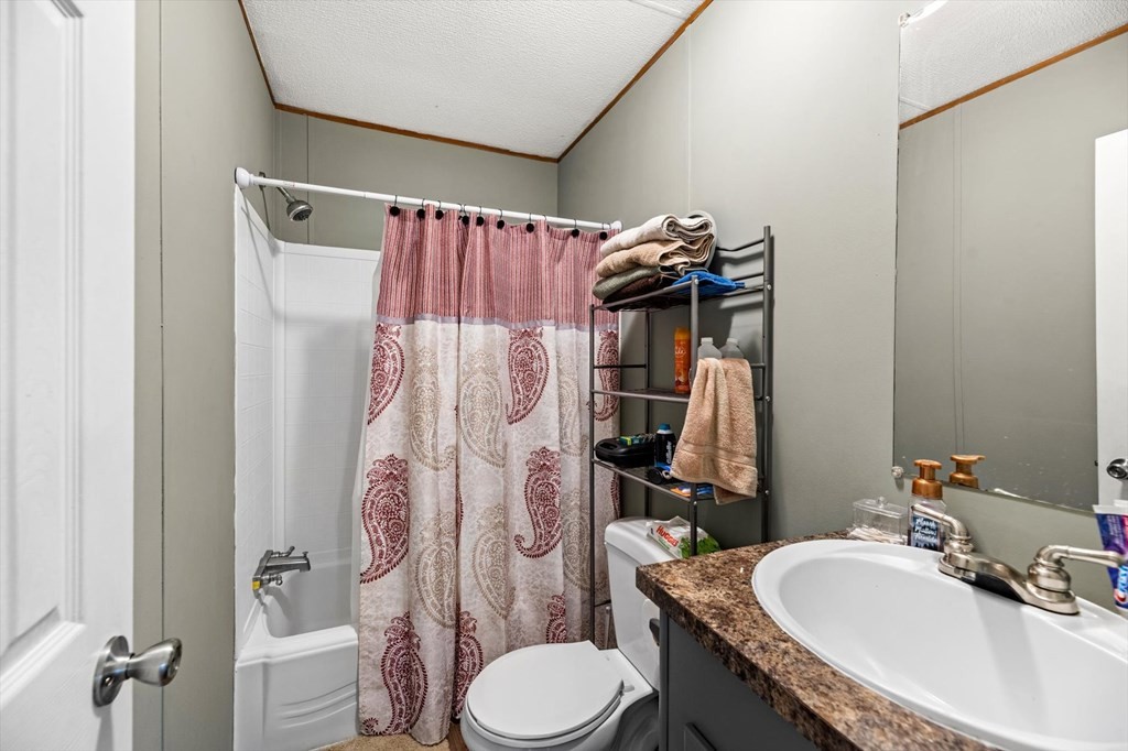 160 Beverly Drive Decatur, TN 37322 - Photo 16 of 31 a bathroom with a sink toilet and shower