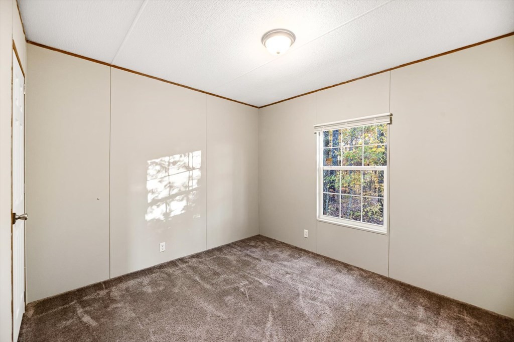 160 Beverly Drive Decatur, TN 37322 - Photo 17 of 31 an empty room with windows