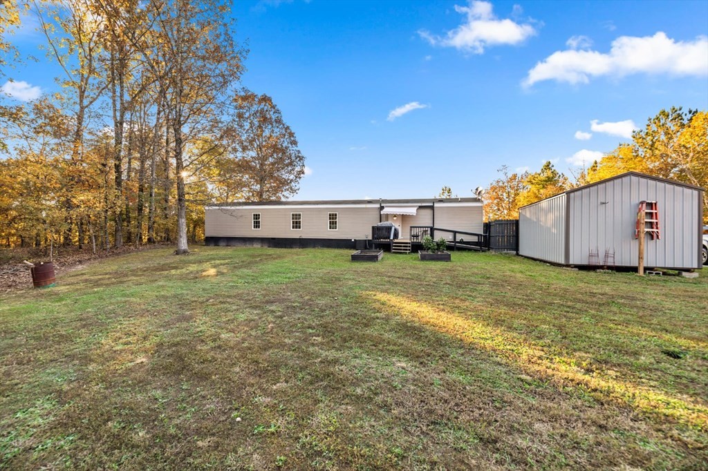 160 Beverly Drive Decatur, TN 37322 - Photo 21 of 31 a view of a house with a yard